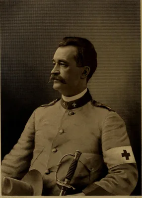 SENN, M. J. E.